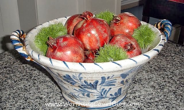 A bowl of pomegranates in the kitchen