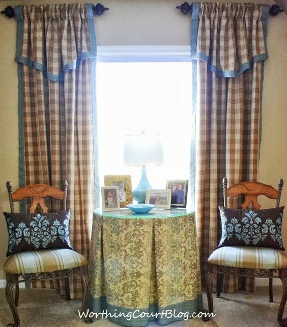 Drapery panels and box pleated table cover in the master bedroom sitting area