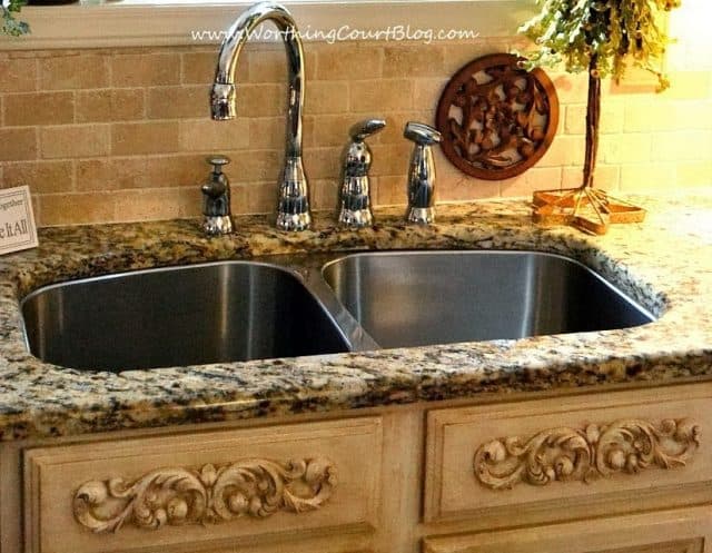 DIY French Country Kitchen Makeover: appliques were added to faux drawer fronts under the sink