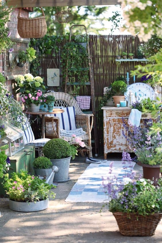 Loads of tips for how to create and inviting outdoor space. Create instant walls with rolls of bamboo fencing. It's very affordable and easy to install.