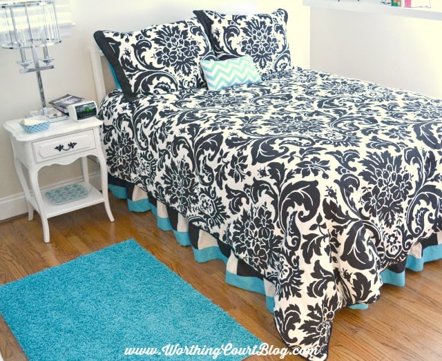Use a coordinating sheet to add trim to a bed skirt to make it pop