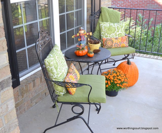 Front porch sitting area with Fall decorations