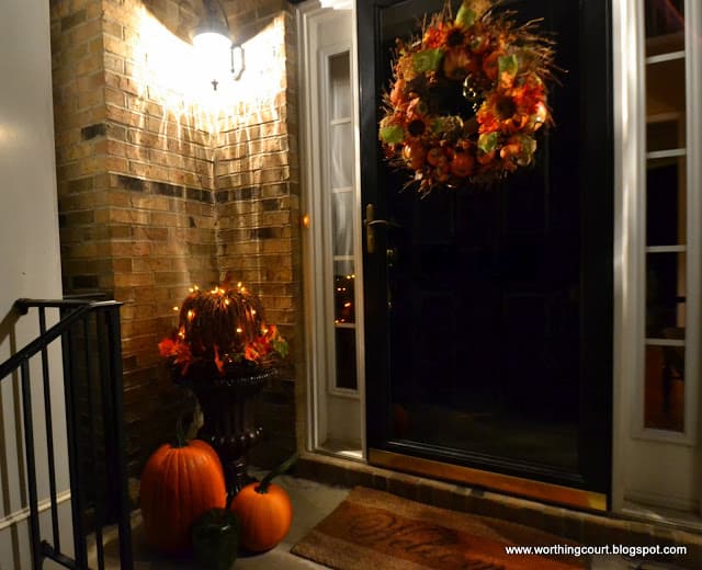 Fall porch decorations at night