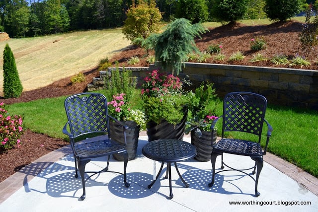 patio seating area and retention wall via Worthing Court blog