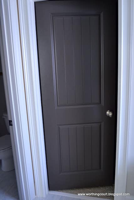 interior door painted charcoal gray via Worthing Court blog