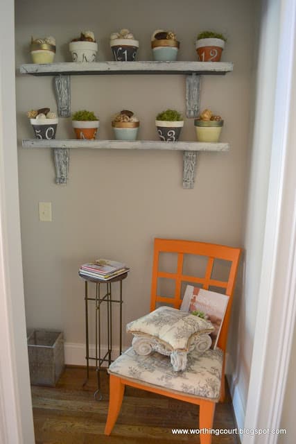 painted clay pots on shelves via Worthing Court blog