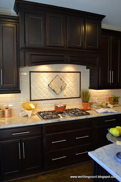 dark kitchen cabinetry via Worthing Court blog