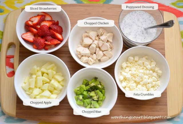 Ingredients for a tasty Strawberry Chicken Salad Recipe all measured out in white bowls.