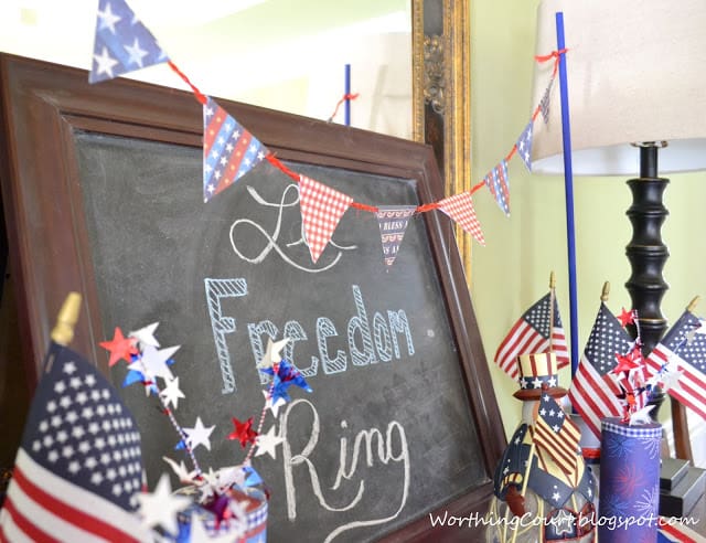 A chalkboard that says freedom ring.