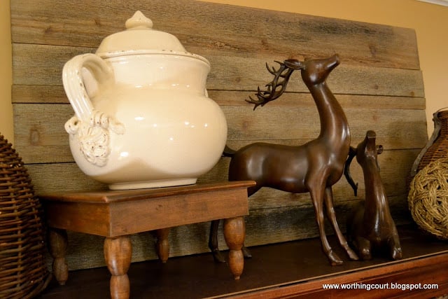 Deer and a tea pot vignette.