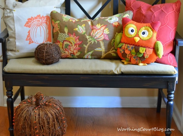 Worthing Court: bench filled with fall pillows