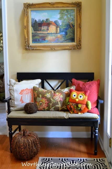 Worthing Court: bench filled with fall pillows