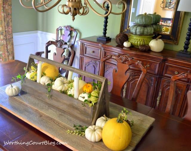 Worthing Court: fall centerpiece and sideboard vignetter with yellow, white and twiggy pumpkins