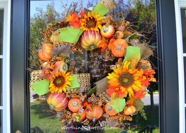 Fall wreath with pumpkins and sunflowers