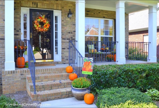 Front porch decorated for Fall