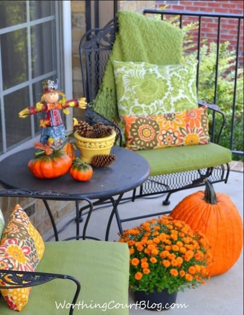 Front porch sitting area decorated for Fall