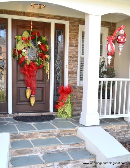 Worthing Court: Christmas wreath and oversized ornaments grace the front porch