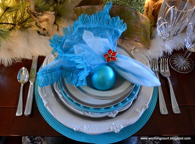 Worthing Court: Turquoise and white Christmas place setting with a pop of red