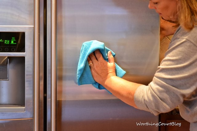 How do you clean a stainless steel fridge?