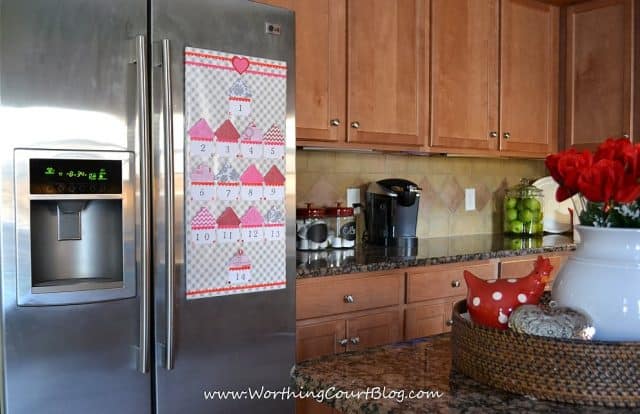 Countdown to Valentine's Day calendar mounted on the refrigerator with Command velcro strips