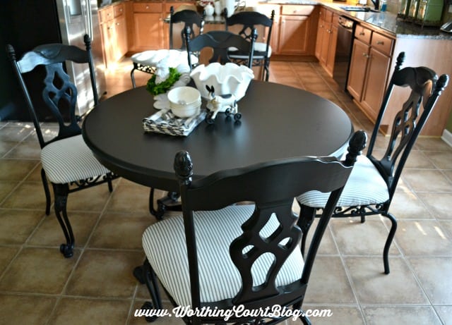Kitchen chair makeover using black spray paint and black and white ticking fabric || WorthingCourtBlog.com