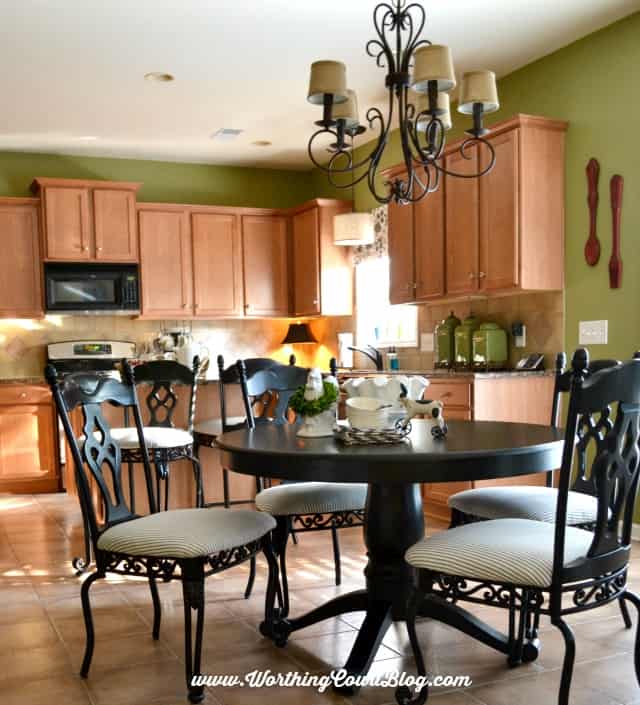 Kitchen chairs transformed with black spray paint and black and white ticking fabric || WorthingCourtBlog.com