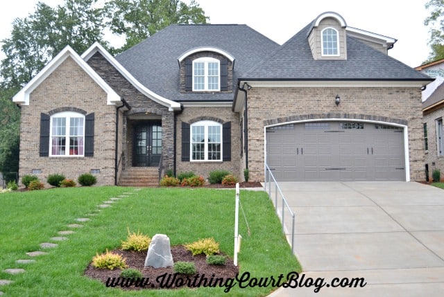 Exterior of brick transitional style house