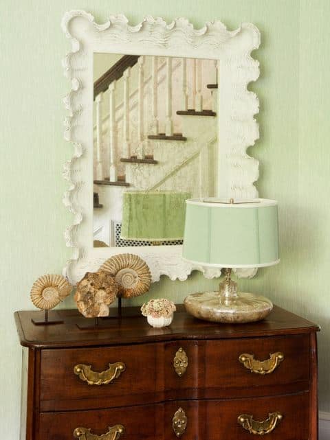 Pretty and soft mint green and current accessories give this traditional chest and updated look.