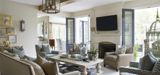 A lovely living room filled with grays and soothing blues by Ivy Lane