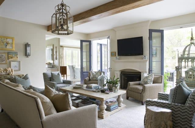 A lovely living room filled with grays and soothing blues by Ivy Lane