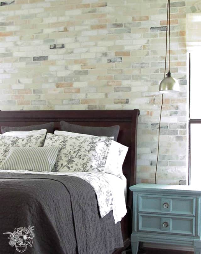 Amazingly real stenciled brick feature wall