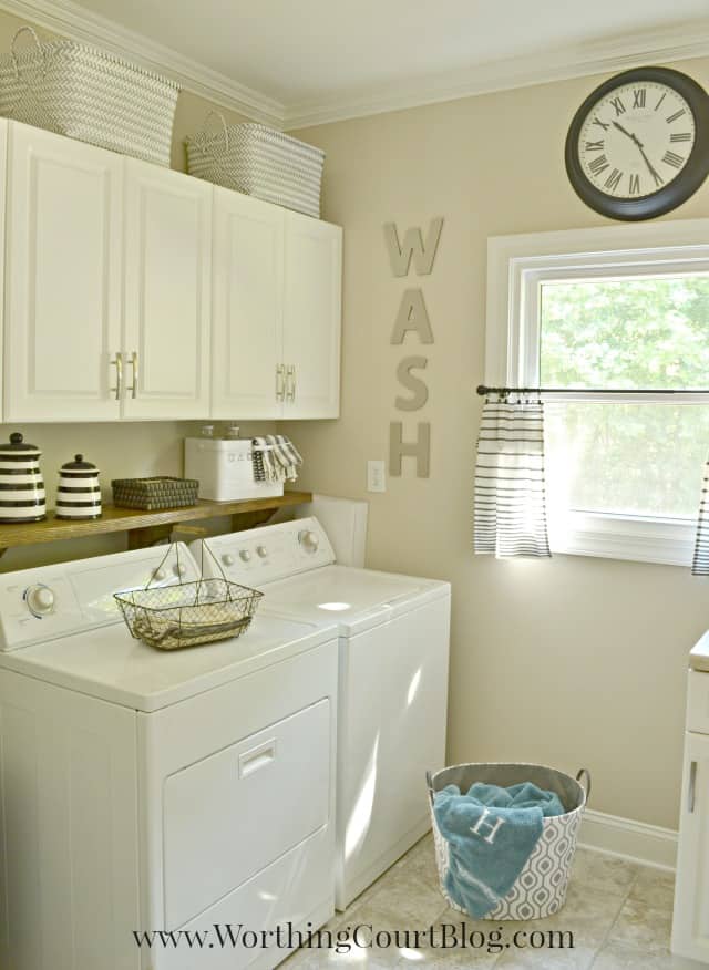 Laundry room with farmhouse and rustic touches