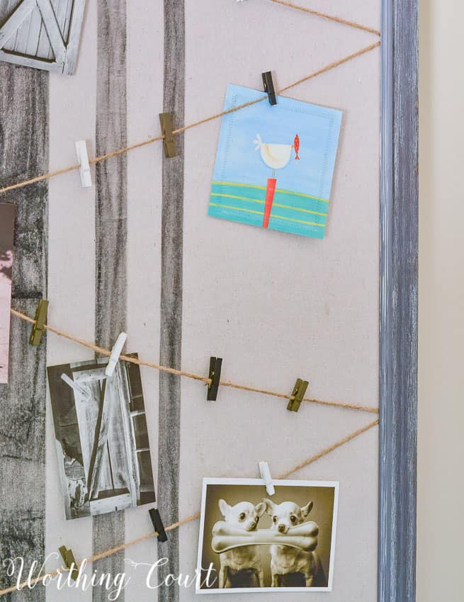Run twine across a bulletin board and use cute clothespins to display small cards and pictures