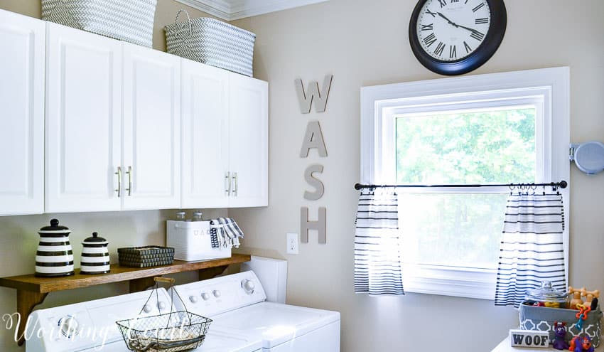 DIY shelf behind washer and dryer to hold laundry supplies || Worthing Court