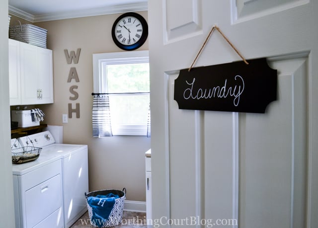 Updated laundry room with modern and rustic touches