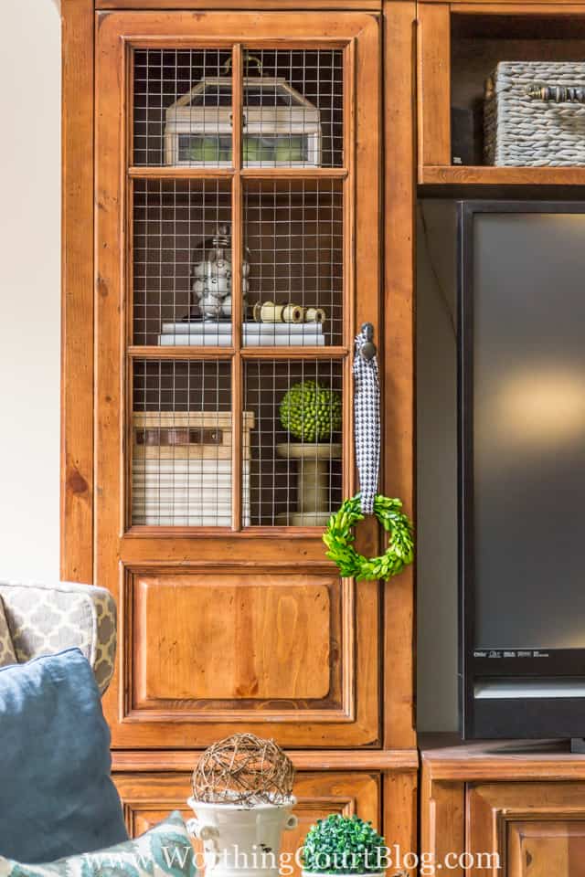 Entertainment center makeover and replacing the glass doors with cage wire