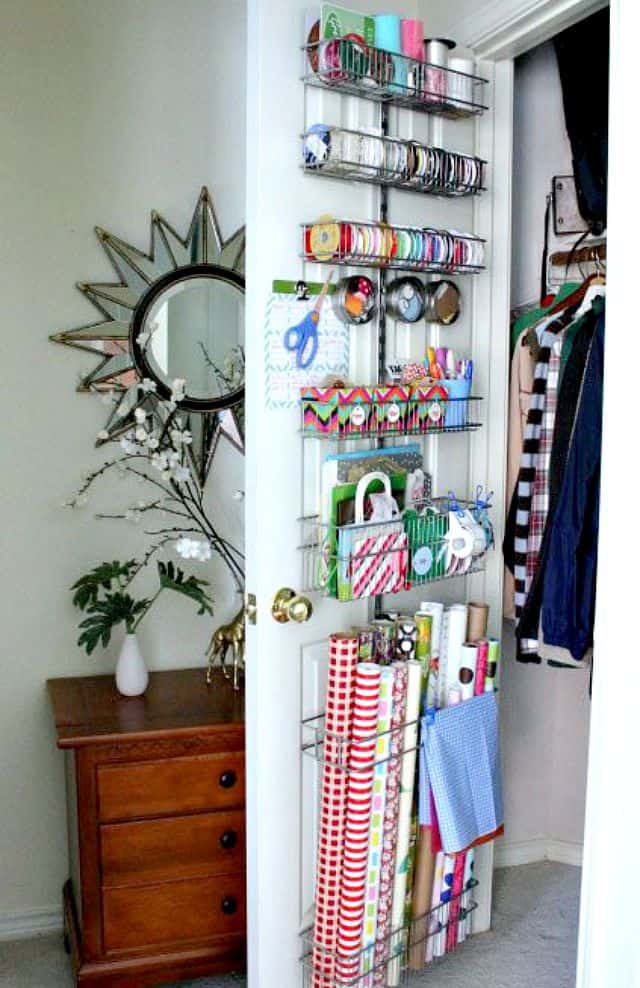 Store wrapping paper and supplies on the inside of a closet door.