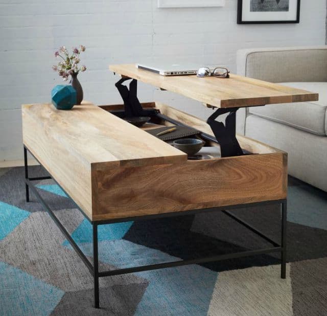A pull-up coffee table can serve as a work space, eating space or play space and provides great functionality in a small family room