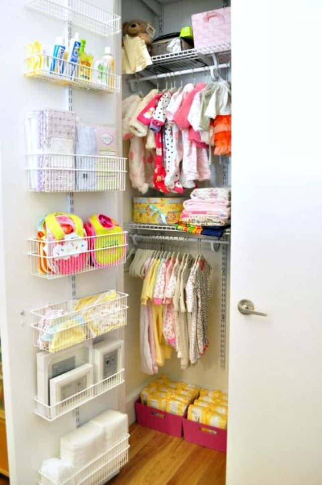 Use an adjustable shelf strip to store baby supplies on the inside of a closet door.