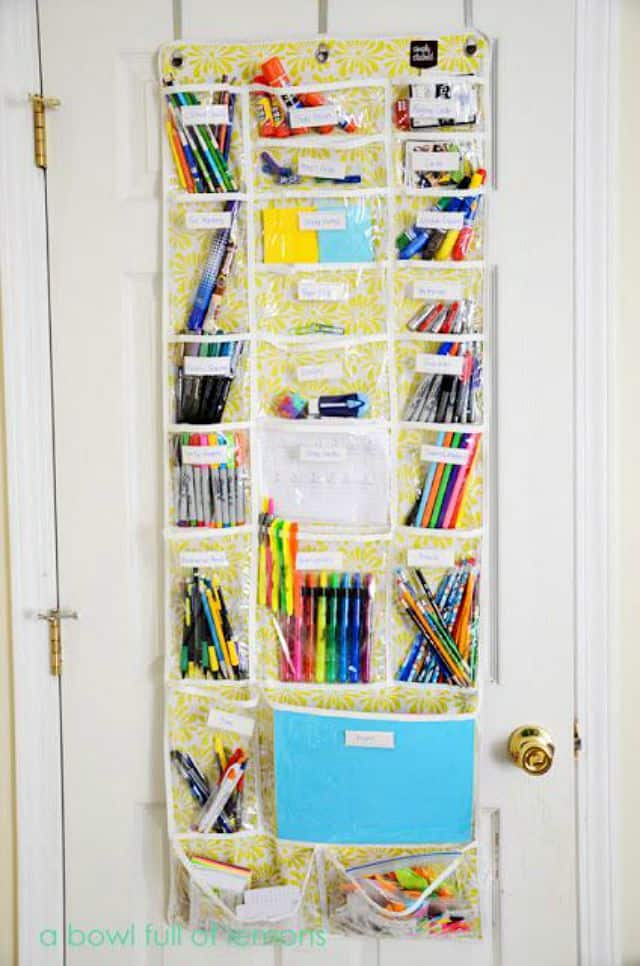 Hang a shoe bag on the inside of a closet door to hold school and art supplies