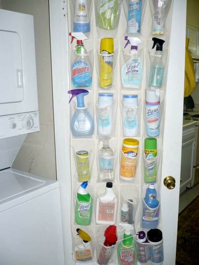 Store cleaning supplies in a hanging shoe bag on the inside of a closet door