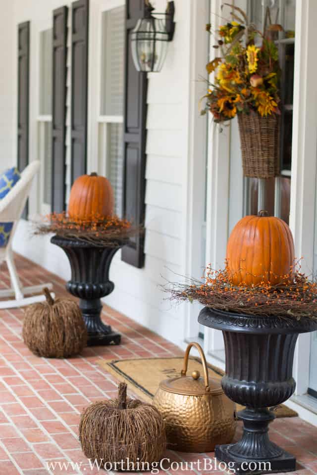 Easy And Simple Fall Front Porch with two urns at the front door.