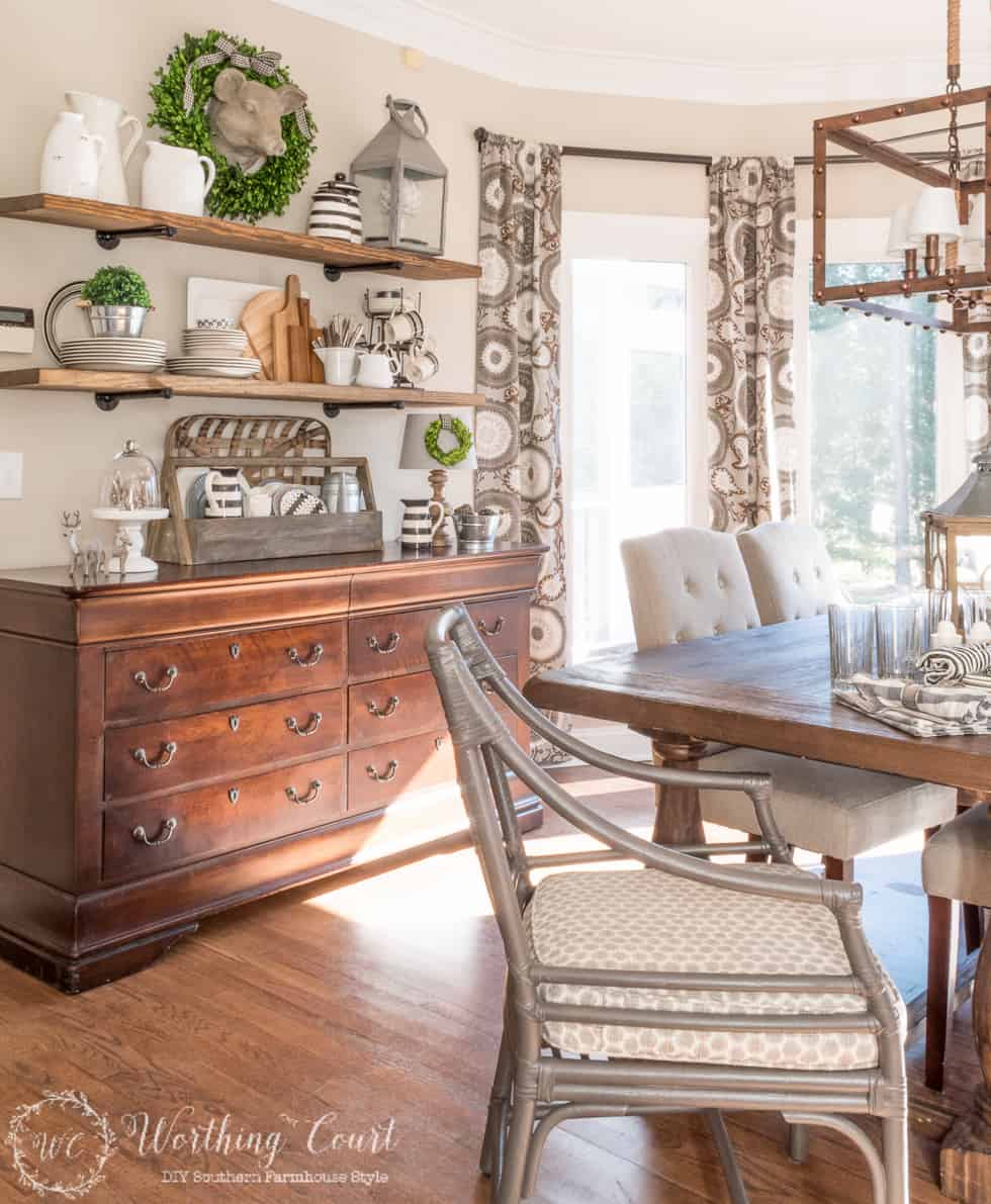 Breakfast Area Makeover Reveal with a wooden hutch and open wooden shelves.