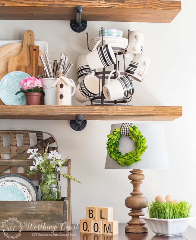 Rustic farmhouse open shelves decorated for spring