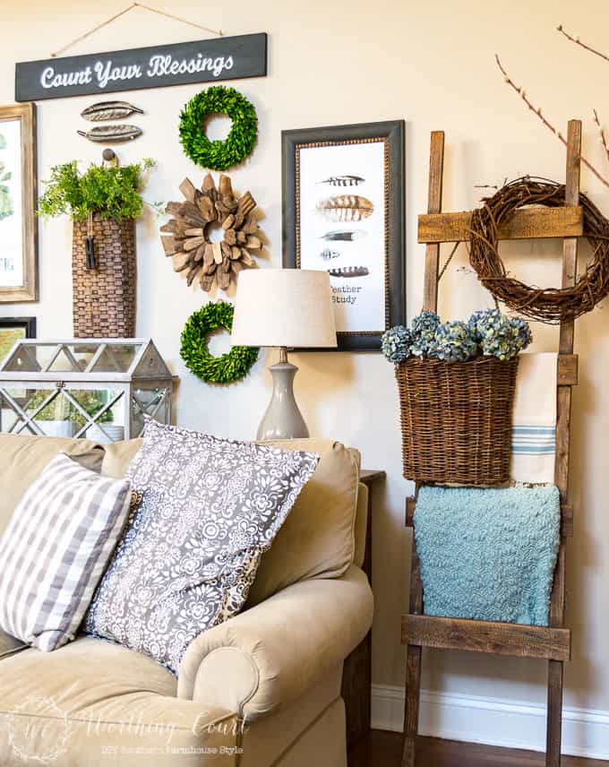 I love seeing the before and after transformation of any room. A DIY rustic ladder is one of the many touches added to this family room makeover that is filled with farmhouse touches. 