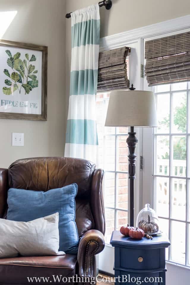 The before and after of this family room is amazing. It was taken from dark and dated to light and bright filled with rustic farmhouse touches.