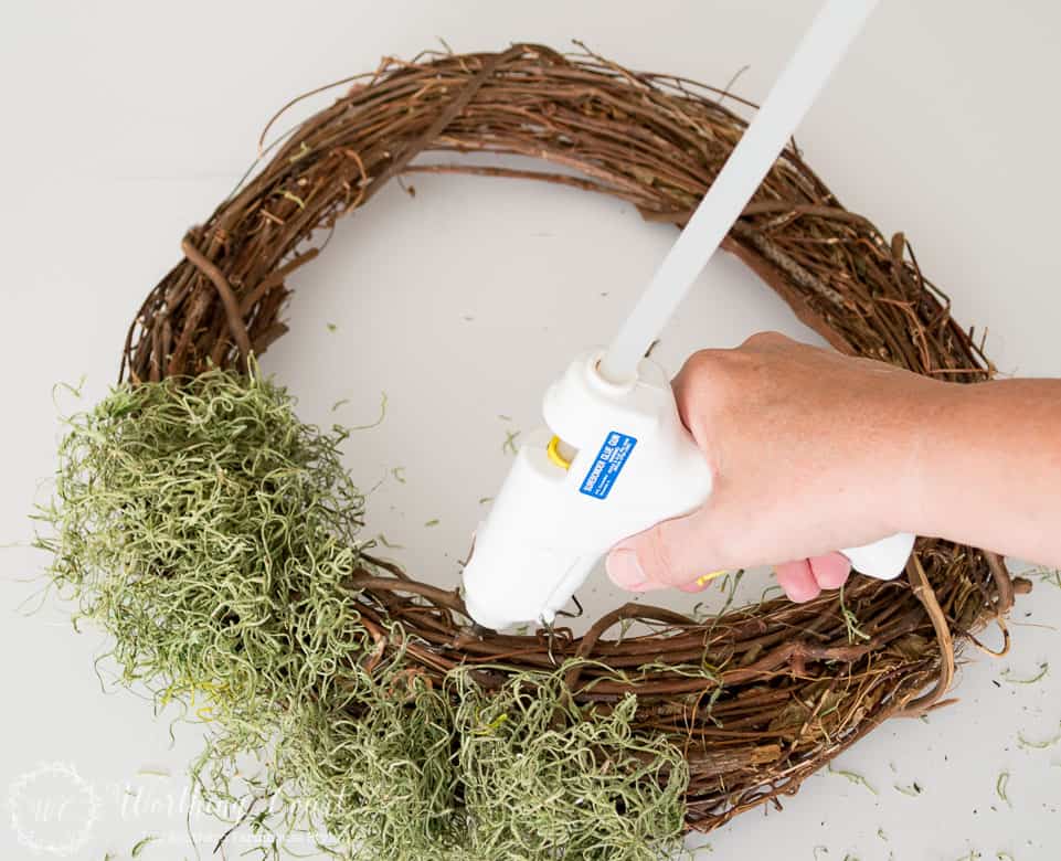 attaching spanish moss to a wreath