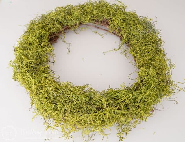 grapevine wreath covered with spanish moss