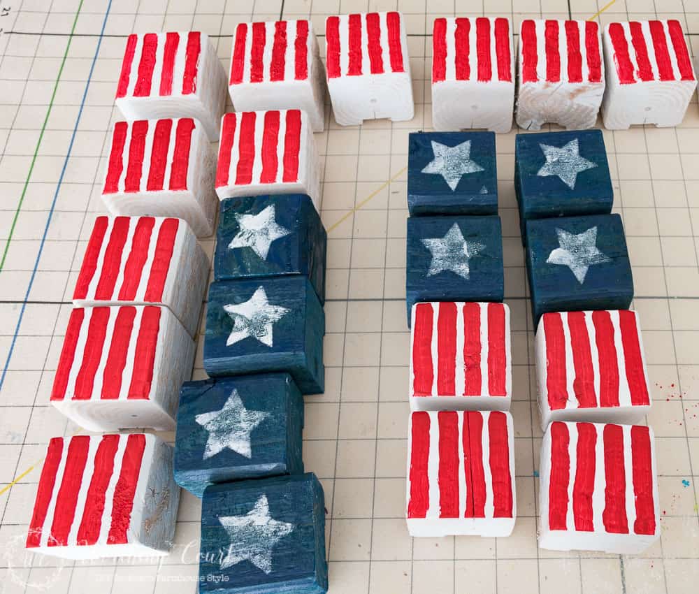 An easy and fun patriotic craft for Memorial Day, Flag Day and July 4th. How to create a vintage Americana look flag by painted wood blocks. Even kids would love to take apart and put the USA flag back together.