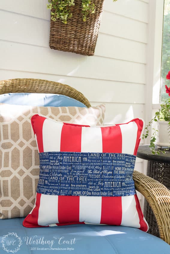 Don't buy holiday or season specific pillows. Simply wrap existing pillows with a piece of fabric and pin it with safety pins on the back side!